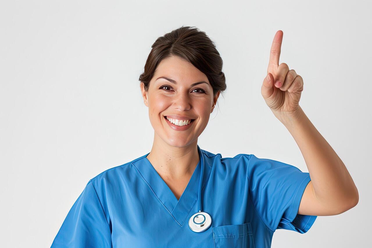 A person wearing blue scrubs pointing up
AI-generated content may be incorrect.